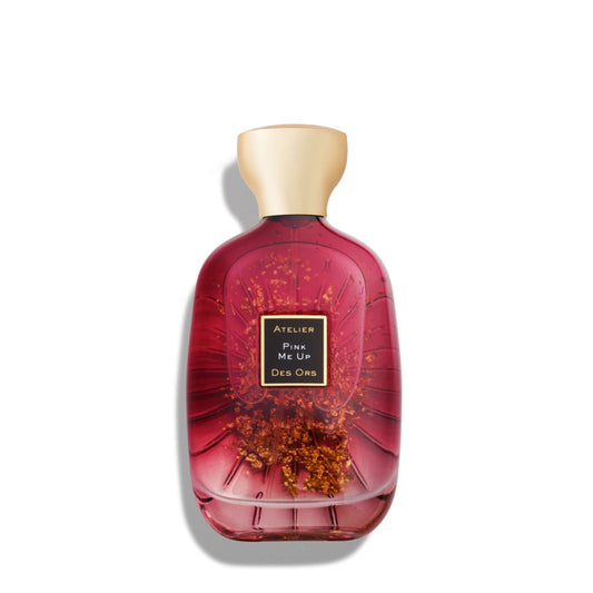 Red perfume bottle with gold cap on a white background